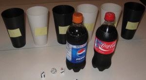 The Setup: 6 labeled cups, 2 drinks, and a 20-sided die